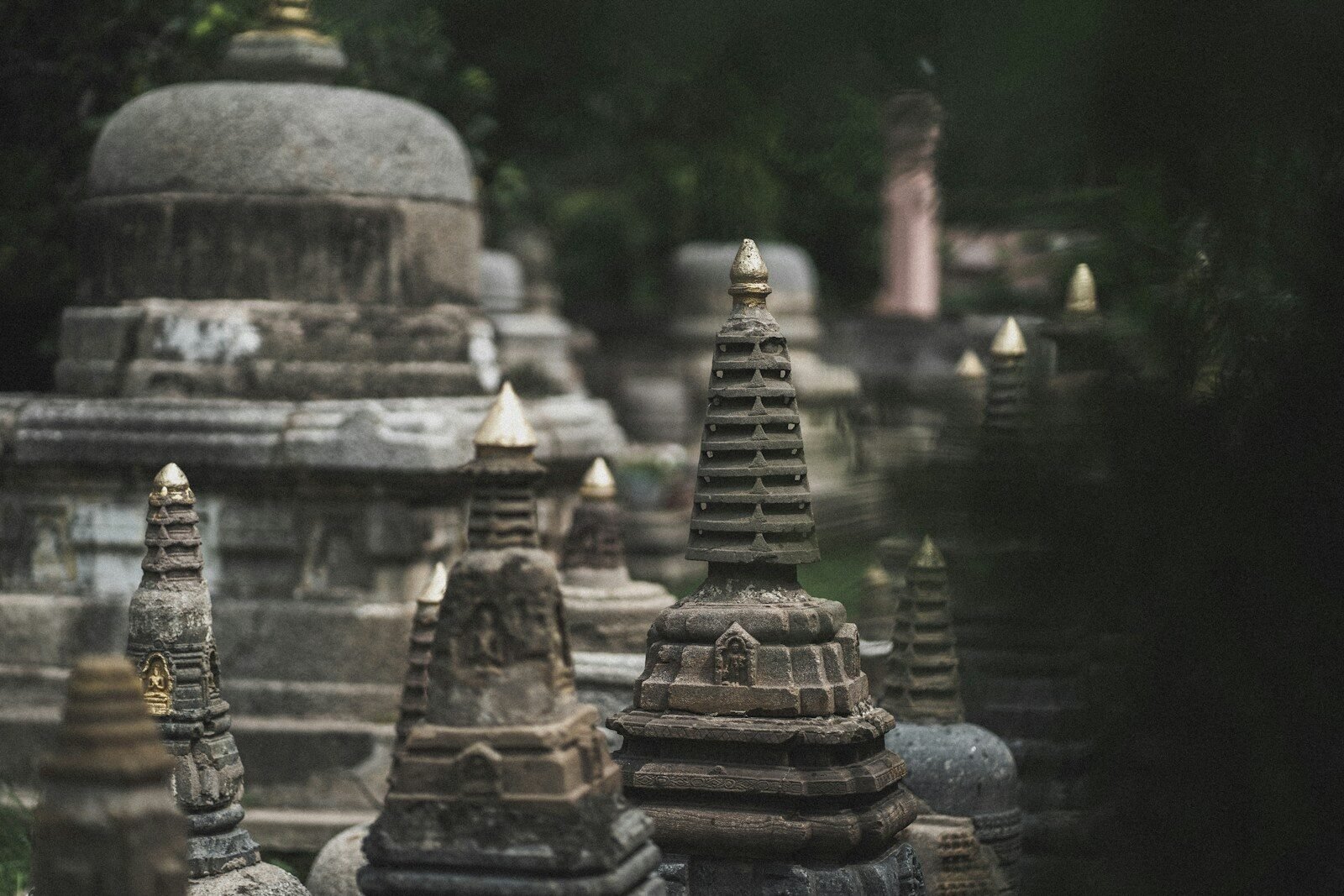 Temple towers lit up at night in Bodh Gaya